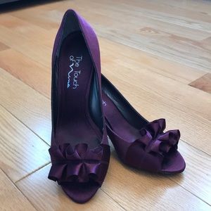 The Touch of Nina purple heels.